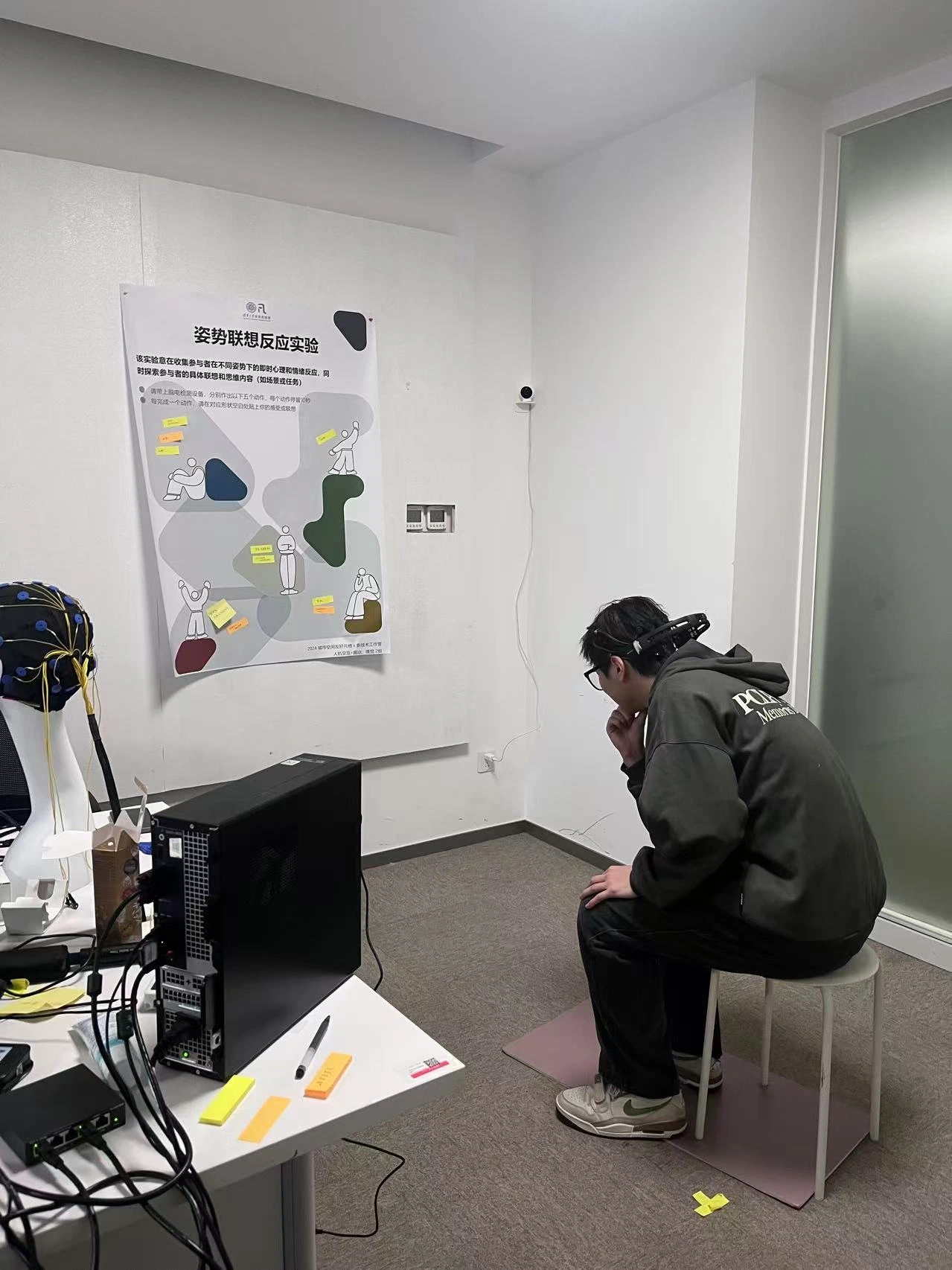 A participant completing a seated posture task.